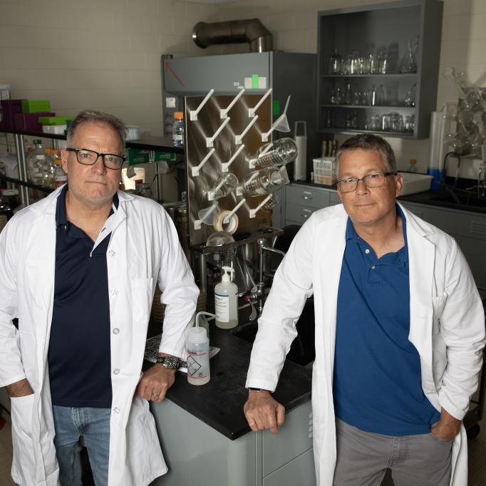 Researchers Michael Farrell (left) and Brian Hammer are working on a potential new way to boost the effectiveness of influenza vaccines. (Credit: Sean McNeil)
